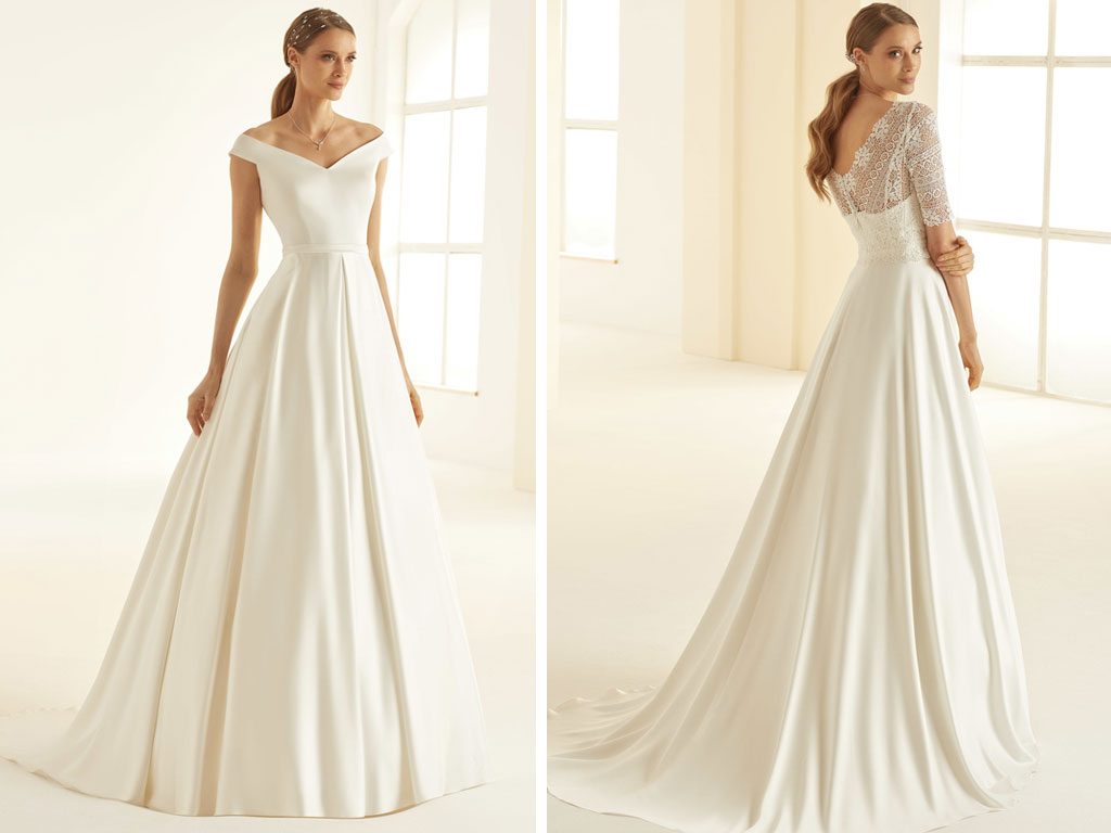 Elegantes Standesamtkleid im A-Linie Stil in Ivory mit tiefem V-Ausschnitt und fein gearbeitetem Spitzenrücken – modern, schlicht und zeitlos.